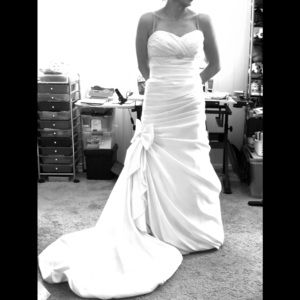 New never worn wedding gown from David’s bridal.
